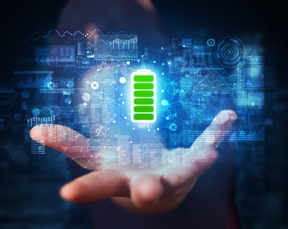 Digital illustration of fully charged battery icon with data visualization representing battery backup and power resilience in emergency systems